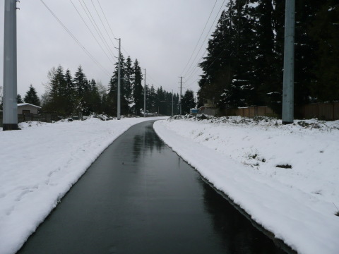 image of the Snohomish county interurban trail in the rain
